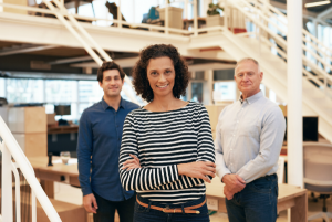 Family owned small business woman and her father and brother